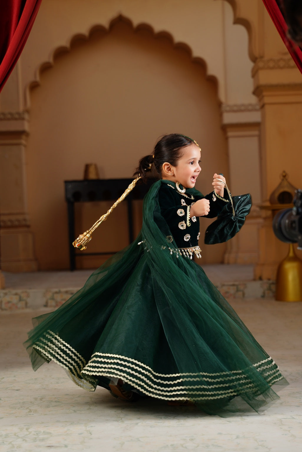 Andaz dark green lehenga twirl view